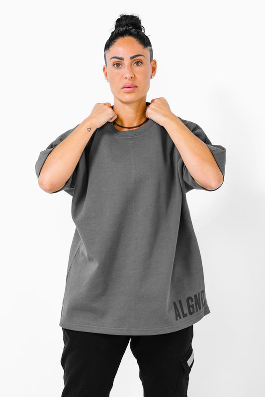 Danielle tortorello in grey textured t shirt 